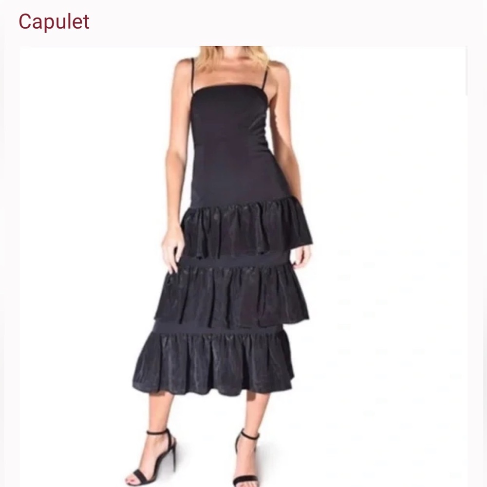 Capulet tiered black dress spaghetti strap. Stretchy size small. NEVER WORN